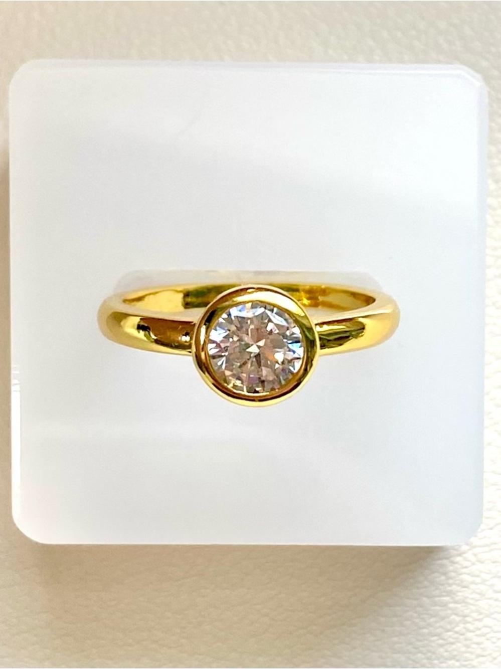 Gold Bezel Solitaire Ring with Clear Stone